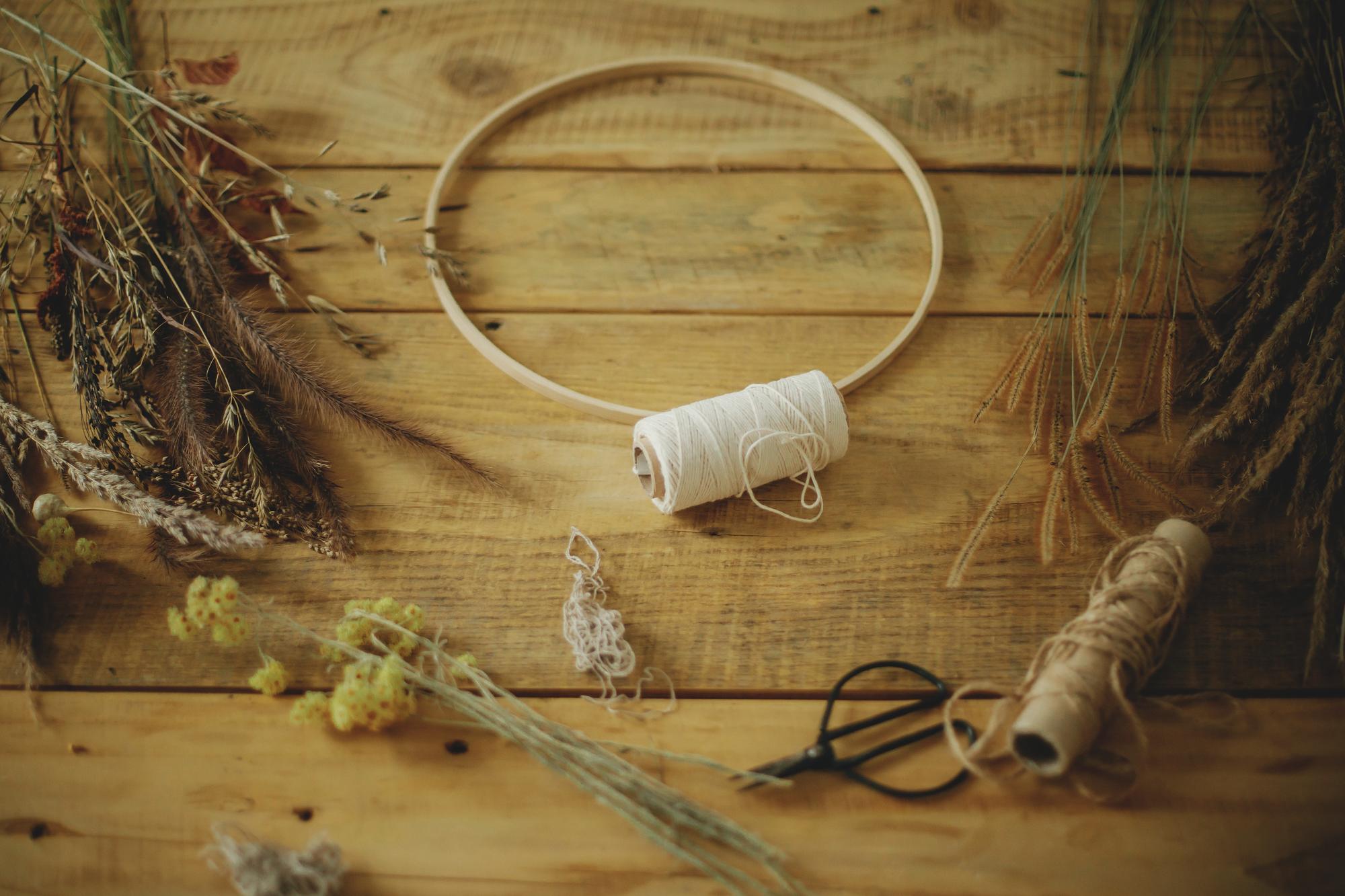 workshop table with threads and hoops