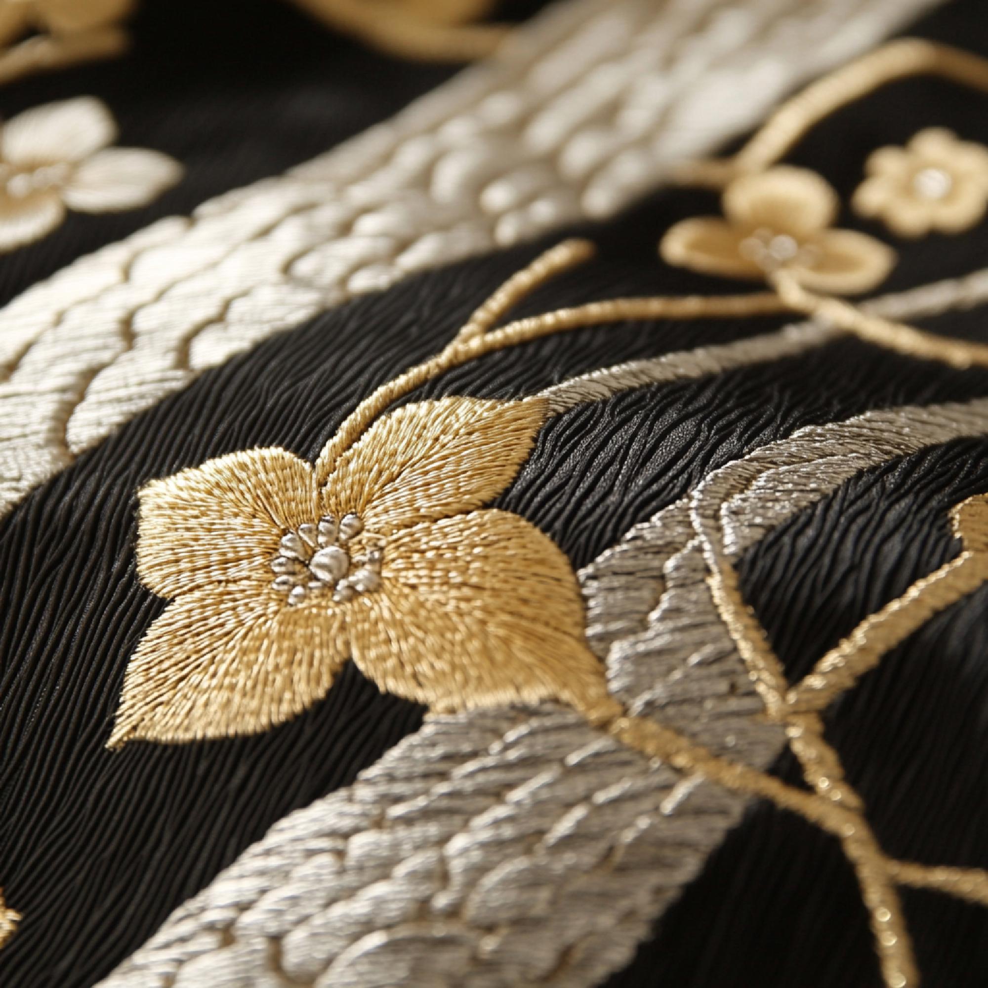 close-up luxury embroidered textile with gold thread